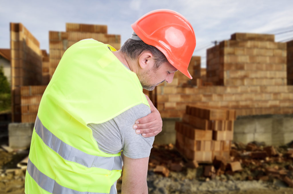 contractor man with pain in shoulder