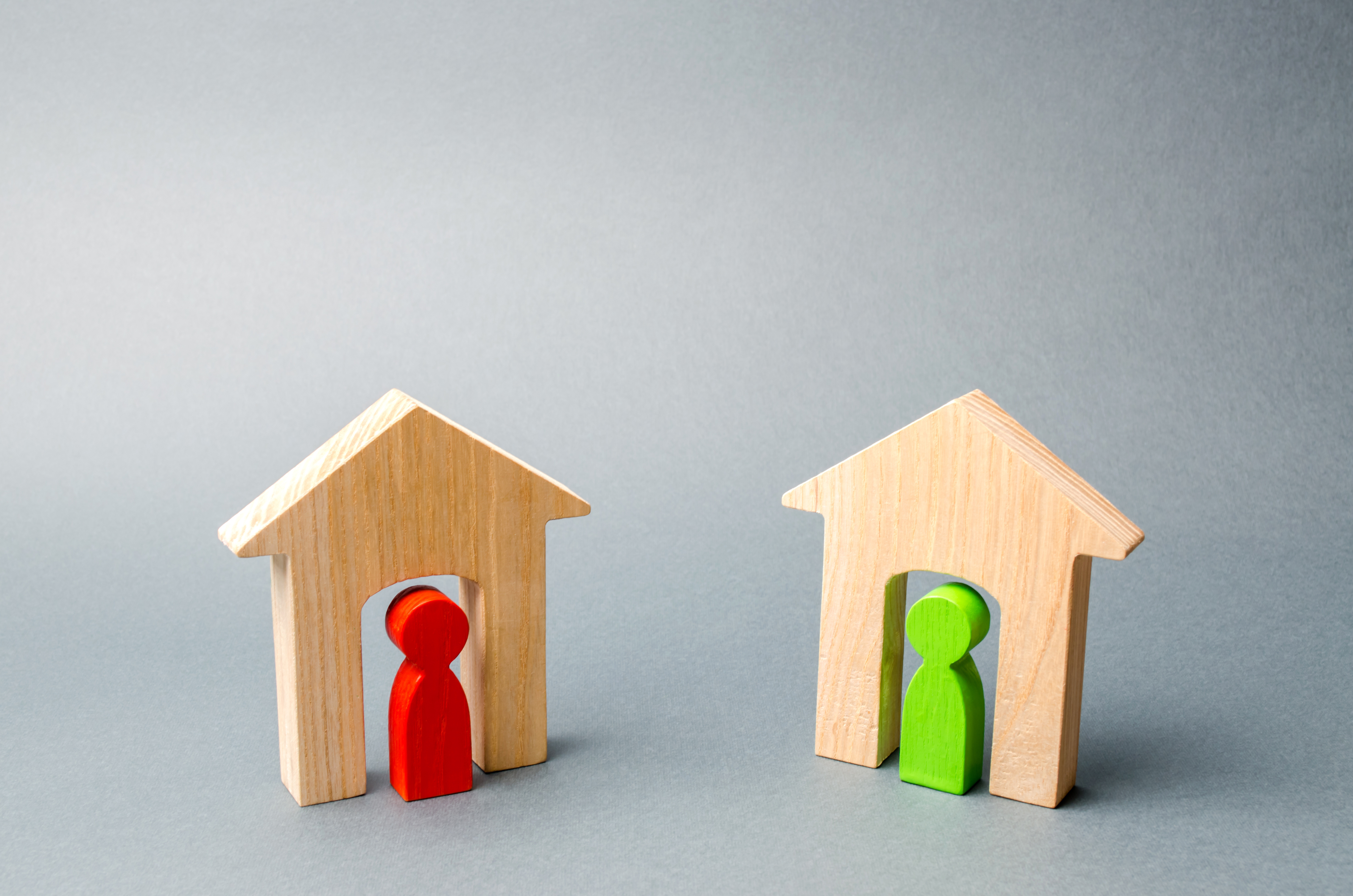 two wooden houses with wooden neighbors inside